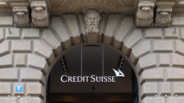A logo above the entrance to the Credit Suisse Group AG headquarters in Zurich, Switzerland, on Thursday, Aug. 31, 2023. UBS posted the biggest-ever quarterly profit for a bank in the second quarter as a result of its emergency takeover of Credit Suisse, and confirmed that it would fully integrate the local business of its former rival by next year.