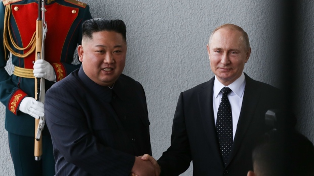 Kim Jong Un, North Korea’s leader, left, shakes hands with Vladimir Putin, Russia’s president, ahead of a summit near Vladivostok, Russia, in 2019.