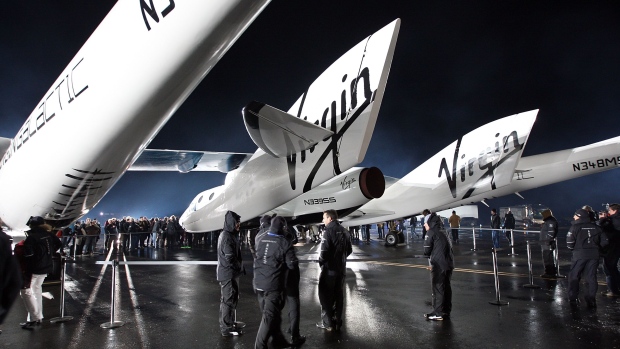 MOJAVE, CA - DECEMBER 7: Virgin Galactic unveils its new SpaceShipTwo spacecraft at the Mojave Spaceport on December 7, 2009 near Mojave, California. The eight-person VSS Enterprise, named after the Star Trek ship of the same name, is the first of a series of space-planes for customers of Virgin Galactic who have paid around $200,000 for a suborbital flight into space. British entrepreneur Sir Richard Branson is financing the spacecraft and aerospace designer Burt Rutan is building it through The Spaceship Company, a joint venture of Scaled Composites and Virgin Group. (Photo by David McNew/Getty Images)