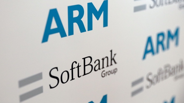 Logos of ARM Holdings Plc and SoftBank Group Corp sit on a background during a news conference in London, U.K., on Monday, July 18, 2016. SoftBank Group Corp. agreed to buy ARM Holdings Plc for 24.3 billion pounds ($32 billion), securing a slice of virtually every mobile computing gadget on the planet and future connected devices in the home. Photographer: Chris Ratcliffe/Bloomberg