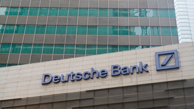 Deutsche Bank AG signage at the One Raffles Quay complex in Singapore, on Friday, April 14, 2023. Deutsche Bank aims to double private-banking revenue from Asia in five years by ramping up efforts to attract the region’s ultra-wealthy, joining other firms seeking to pounce on opportunities created by the near-collapse of Credit Suisse Group AG.