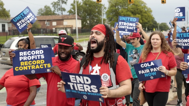 Demonstrators during a UAW practice picket outside the Stellantis Mack Assembly Plant in Detroit on Aug. 23. Photographer: Jeff Kowalsky/Bloomberg