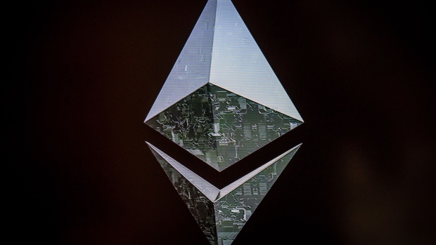 An Ethereum logo on an electronic screen inside a cryptocurrency exchange in Barcelona.
