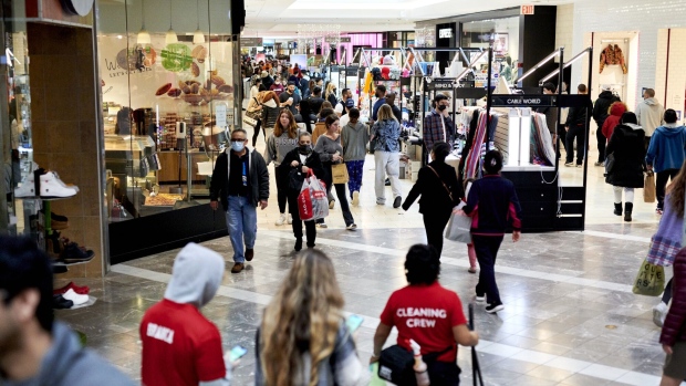 Shoppers walk through the Westfield Garden State Plaza mall 