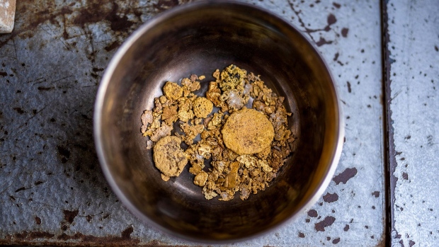 A bowl of gold, purchased by a gold trader from local miners and millers, in Atbara, Sudan, on Thursday, Oct. 14, 2021. Mining ore in the sweltering heat of the Nubian desert is the first stage of an illicit network that has exploded in the past 18 months following a pandemic-induced spike in the gold price. Photographer: Simon Marks/Bloomberg