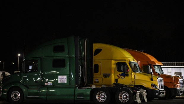 Trucks parked at a Love's Travel Stop in in Hagerstown, Maryland, U.S., on Saturday, Dec. 11, 2021. More spending on the freight network in the U.S. is needed to improve supply chain issues, according to a new report released this week from the research group TRIP.