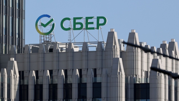 A logo above a Sberbank PJSC bank building in Moscow, Russia, on Monday, Feb. 28, 2022. The Bank of Russia acted quickly to shield the nation’s $1.5 trillion economy from sweeping sanctions that hit key banks, pushed the ruble to a record low and left President Vladimir Putin unable to access much of his war chest of more than $640 billion.