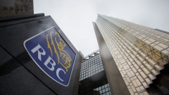Signage is displayed outside of the Royal Bank of Canada (RBC) headquarters building during the company's annual general meeting in Toronto, Ontario, Canada, on Thursday, April 6, 2017. RBC Chief Executive Officer David urged lawmakers to coordinate interventions and act quickly to cool housing markets, particularly in Toronto and Vancouver.
