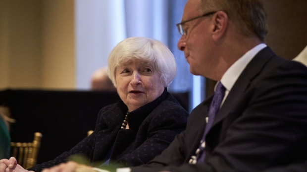 Janet Yellen, US Treasury secretary, and Larry Fink, chief executive officer of Blackrock Inc., right, at a roundtable meeting during the Bloomberg Transition Finance Action Forum in New York, US, on Tuesday, Sept. 19, 2023. The forum will convene leaders from both the private and public sectors, uniting their efforts to acknowledge the progress achieved in the realm of transition finance while propelling further action in support of a global net-zero economic transformation.