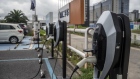 Charging stations for General Motors Co. Buick Velite electric vehicle (EV) stand outside the company's dealership in Shanghai, China, on Wednesday, July 17, 2019. The future for GM in China is in the hands of customers considering whether to go electric. No other country comes close to China, in terms of scale and adoption of new-energy vehicles, where more electric cars have been sold in Shanghai alone than in all of the U.S., U.K., or Germany.