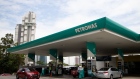 Vehicles are refueled at a Petroliam Nasional Bhd. (Petronas) gas station in Johor Bahru, Johor, Malaysia, on Thursday, June 20, 2019. Malaysia's Prime Minister Mahathir Mohamad said he underestimated the challenges of governing the country before his shock election victory last year. “I underestimated because we were on the outside and we didn’t get any information on what was happening on the inside,” Mahathir said.