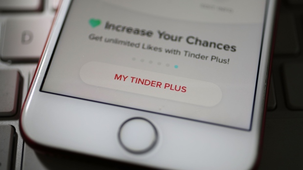 MIAMI, FL - AUGUST 14: In this photo illustration, the dating app Tinder is seen on the screen of an iPhone on August 14, 2018 in Miami, Florida. The co-founders of Tinder and eight other former and current executives of the dating app are suing the service's current owners for at least $2 billion. (Photo illustration by Joe Raedle/Getty Images)
