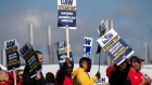 UAW members on a picket line in Toldeo, Ohio. Photographer: Emily Elconin/Bloomberg