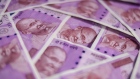 Indian two thousand rupee banknotes. Photographer: Dhiraj Singh/Bloomberg