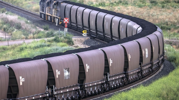 A freight train transports coal from the Gunnedah Coal Handling and Prepararation Plant, operated by Whitehaven Coal Ltd., in Gunnedah, New South Wales, Australia, on Tuesday, Oct. 13, 2020. Prime Minister Scott Morrison warned last month that if power generators don't commit to building 1,000 megawatts of gas-fired generation capacity by April to replace a coal plant set to close in 2023, the pro fossil-fuel government would do so itself. Photographer: David Gray/Bloomberg