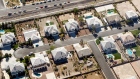 HENDERSON - NOVEMBER 06: An aerial view of homes on November 6, 2008 in Henderson, Nevada. As bad loans drove homeowners originally into foreclosure earlier this year, rising unemployment is now fueling the mortgage crisis downhill spiral. (Photo by Ethan Miller/Getty Images)