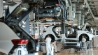 DRESDEN, GERMANY - JUNE 08: Workers assemble Volkswagen ID.3 electric cars at the "Gläserne Manufaktur" ("Glass Manufactory") production facility on June 08, 2021 in Dresden, Germany. The Dresden plant is currently churning out 35 ID.3 cars per day. The ID.3 and ID.4 cars are also produced at VW's Zwickau plat located in the same region. (Photo by Sean Gallup/Getty Images)