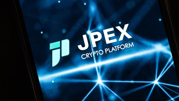 The logo of cryptocurrency platform JPEX arranged in Hong Kong, China, on Tuesday, Sept. 19, 2023. Cryptocurrency platform JPEX shut down some trading during an ongoing investigation by the Hong Kong police. Photographer: Billy H.C. Kwok/Bloomberg