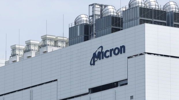 Signage atop a plant operated by Micron Memory Japan KK, a subsidiary of Micron Technology Inc., in Higashihiroshima, Hiroshima Prefecture, Japan, on Monday, May 22, 2023. Japan will subsidize US memory maker Micron's push to produce its new advanced chips in Hiroshima.