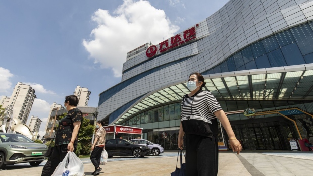 The Dalian Wanda Group Co. Qingpu shopping mall in Shanghai, China, on Thursday, May 25, 2023. Wanda said online rumors that it's selling 20 shopping malls for 16 billion yuan ($2.3 billion) is "untrue", according to a statement on its website. Photographer: Qilai Shen/Bloomberg