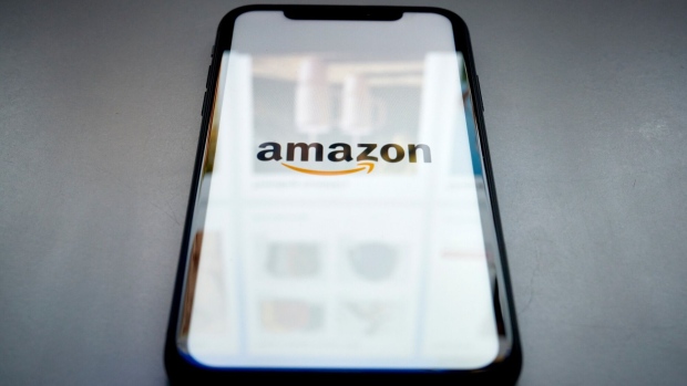 The Amazon.com logo on a smartphone arranged in New York, US, on Tuesday, Sept. 26, 2023. The US Federal Trade Commission sued Amazon.com Inc. in a long-anticipated antitrust case, accusing the e-commerce giant of monopolizing online marketplace services by degrading quality for shoppers and overcharging sellers. Photographer: Gabby Jones/Bloomberg