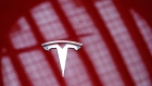 The Tesla Inc. logo is on a Model Y electric vehicle during the vehicle's launch in Kuala Lumpur, Malaysia, on Thursday, July 20, 2023. Tesla unveiled its mid-sized sport utility vehicle — the Model Y — at an event in downtown Kuala Lumpur on Thursday, providing a boost to the Southeast Asian nation’s efforts to promote sustainable mobility. Photographer: Samsul Said/Bloomberg