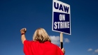 A United Auto Workers member on a picket line outside the Ford Motor Co. Michigan Assembly plant in Wayne, Michigan. Photographer: Emily Elconin/Bloomberg