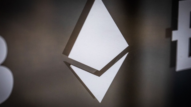 An Ethereum logo on the window of a cryptocurrency exchange in Barcelona.