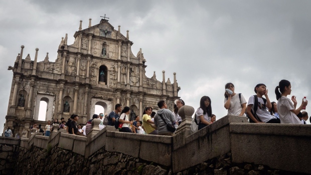 Visitors at the Ruins of St. Paul's in Macau, China, on Thursday, Aug. 24, 2023. Macau’s economy continued to recover, driven by the tourism and gaming sectors, according to a government statement.
