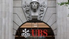 A logo above the entrance to the UBS Group AG headquarters in Zurich, Switzerland, on Thursday, Aug. 31, 2023. UBS posted the biggest-ever quarterly profit for a bank in the second quarter as a result of its emergency takeover of Credit Suisse, and confirmed that it would fully integrate the local business of its former rival by next year. Photographer: Arnd Wiegmann/Bloomberg