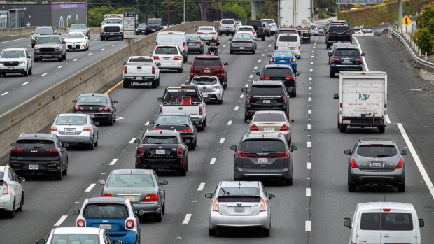 Vehicles on Interstate 80 in Richmond, California, US, on Thursday, May 25, 2023. Long airport lines, jammed planes, higher fares and potential flight delays are set to plague the coming summer travel season as more Americans fly at home and abroad.