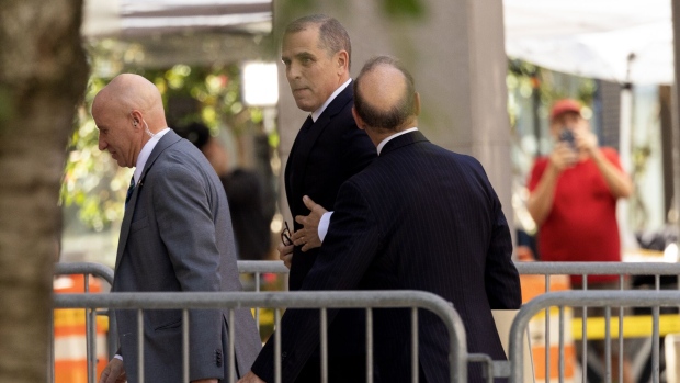 Hunter Biden, son of US President Joe Biden, center, arrives to federal court in Wilmington, Delaware, US, on Tuesday, Oct. 3, 2023. Hunter Biden was indicted in September on federal gun charges, charged with three counts relating to his October 2018 purchase of a Colt Cobra .38 caliber revolver while he was a drug addict. Photographer: Ryan Collerd/Bloomberg