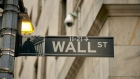 A Wall Street sign near the New York Stock Exchange (NYSE) in New York, US, on Monday, Aug. 28, 2023. Stocks advanced, while bond yields retreated at the start of a week jam-packed with economic reports that will help shape the outlook for Federal Reserve policy. Photographer: Gabby Jones/Bloomberg