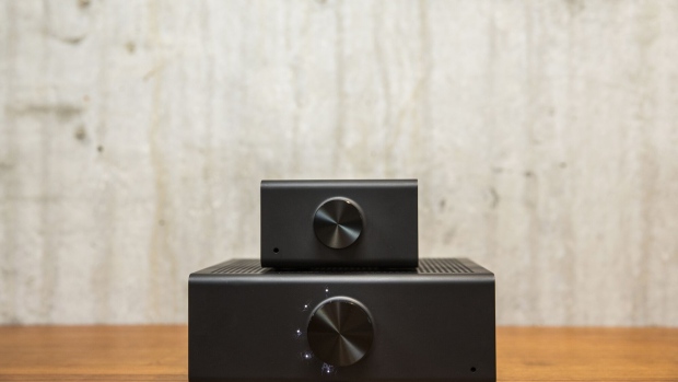 An Amazon Echo Link music streaming device, top, and Link Amp music streaming device and amplifier sit on display at the Amazon.com Inc. Spheres headquarters during an unveiling event in Seattle, Washington, U.S., on Thursday, Sept. 20, 2018. Amazon.com Inc. unveiled its vision for smart homes powered by the Alexa voice assistant, with a dizzying array of new gadgets and features for almost every room in the house -- from a microwave oven to a security camera and wall clock.