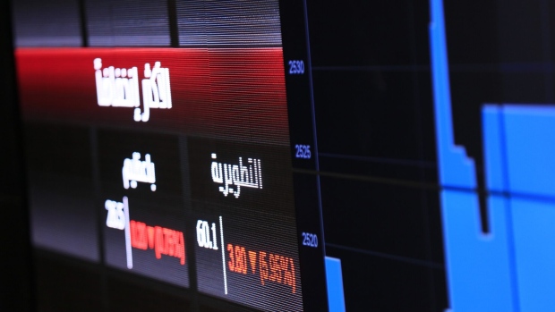 Stock prices sit on a digital display board at the Saudi Stock Exchange, also known as Tadawul, in Riyadh, Saudi Arabia, on Sunday, Nov. 4, 2018. A month after the murder of government critic Jamal Khashoggi in the Saudi consulate in Istanbul, bankers say the rewards of doing business with the oil-rich kingdom far outweigh the risks. Photographer: Mohammed Almuaalemi/Bloomberg