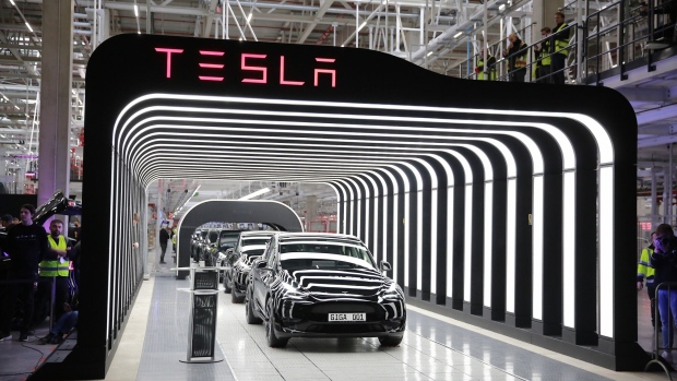 GRUENHEIDE, GERMANY - MARCH 22: Newly completed Tesla electric cars at the official opening of the new Tesla electric car manufacturing plant on March 22, 2022 near Gruenheide, Germany. The new plant, officially called the Gigafactory Berlin-Brandenburg, is producing the Model Y as well as electric car batteries. (Photo by Christian Marquardt/Getty Images)