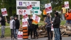 Unifor workers on strike outside GM plant in St. Catharines