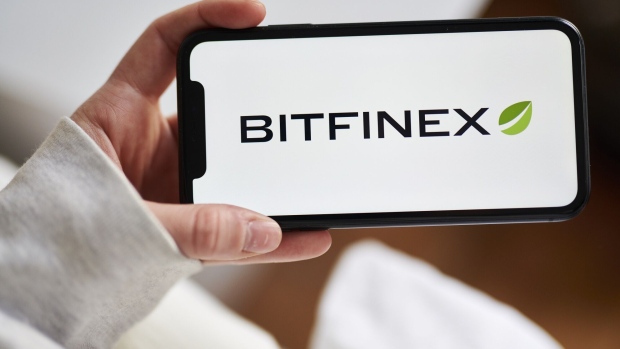 The Bitfinex logo on a smartphone arranged in the Brooklyn Borough of New York, U.S., on Monday, May 24, 2021. Elon Musk continued to toy with the price of Bitcoin Monday, taking to Twitter to indicate support for what he says is an effort by miners to make their operations greener. Photographer: Gabby Jones/Bloomberg