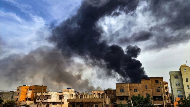 Smoke rises during fighting in Khartoum in June. Sudan’s civil war has been ongoing for six months.