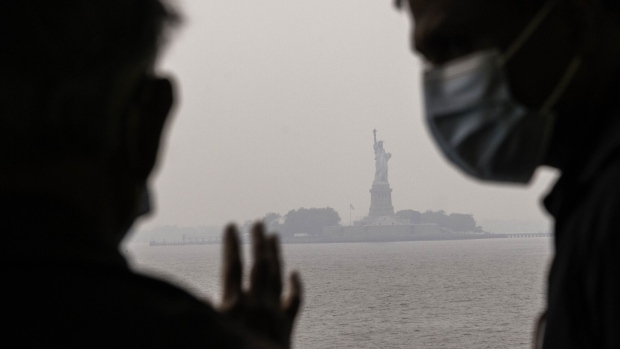 The Statue of Liberty in June, blanketed in smoke from Canada’s wildfires.
