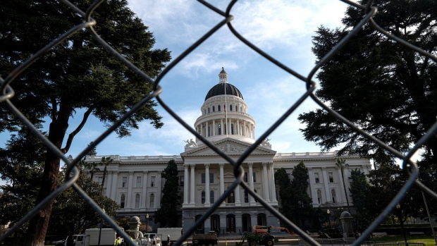 A temporary fence in front of the California State Capitol building in Sacramento, California, U.S., on Friday, Jan. 15, 2021. The FBI warns that pro-Trump protests are planned at U.S. statehouses before the presidential inauguration.