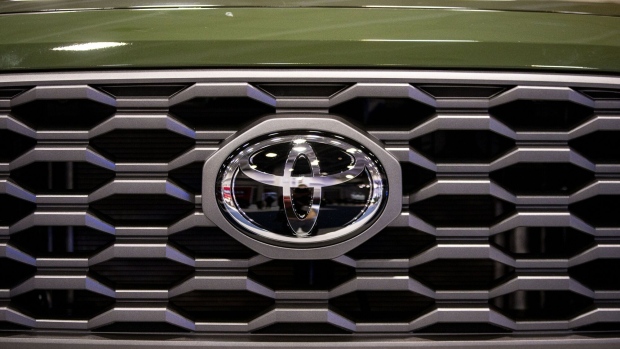 A Toyota logo on the front of a vehicle during the Washington Auto Show in Washington, D.C., U.S., on Friday, Jan. 21, 2022. The auto show, designated as one of the nation's top five auto shows by the International Organization of Motor Vehicle Manufacturers, runs from January 21-30. Photographer: Al Drago/Bloomberg