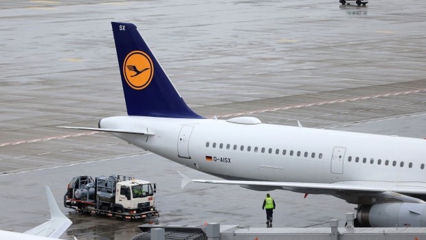 An Airbus A321 passenger aircraft, operated by Lufthansa AG, at an empty Berlin Brandenburg Airport, during a strike by ground services employees, in Berlin, Germany, on Monday, March 13, 2023. German airline passengers face disruption with scores of flights canceled at Berlin airport as ground staff are on strike over pay. Photographer: Krisztian Bocsi/Bloomberg