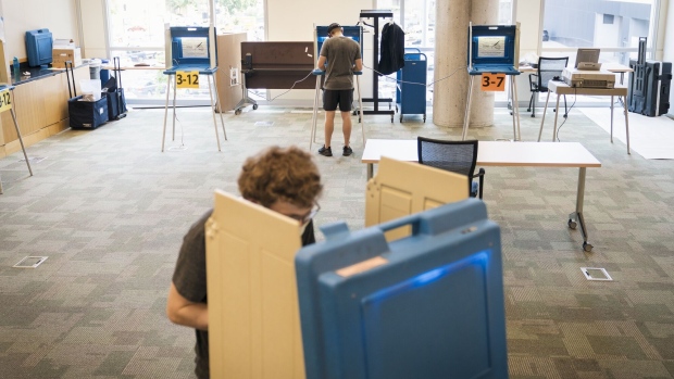 Voters cast ballots at a polling location in Minneapolis.