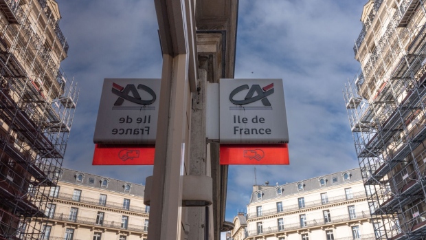 Signage outside a Credit Agricole SA bank branch in Paris, France, on Wednesday, Aug. 2, 2023. Credit Agricole reports earnings on August 4. Photographer: Nathan Laine/Bloomberg