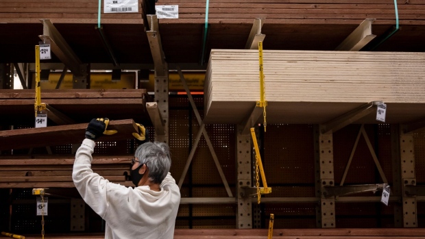A customerc lumber for sale at a Home Depot Inc. store in Daly City, California, U.S., on Monday, Nov. 16, 2020. Home Depot Inc. is scheduled to release earnings figures on November 17. Photographer: Josie Norris/Bloomberg