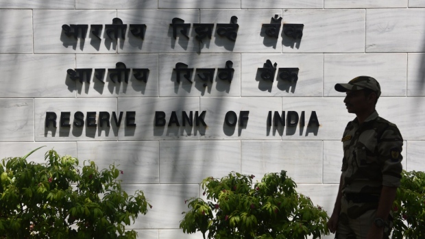 Signage of the Reserve Bank of India (RBI) at its head office in Mumbai, India, on Thursday, April 6, 2023. The Reserve Bank of India’s six-member Monetary Policy Committee unanimously voted on Thursday to keep the repurchase rate at 6.50%, a move expected by only six of 33 economists surveyed by Bloomberg.