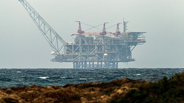 The platform of a natural gas field in the Mediterranean Sea is pictured from the Israeli northern coastal city of Caesarea. Photographer: Jack Guez/AFP/Getty Images