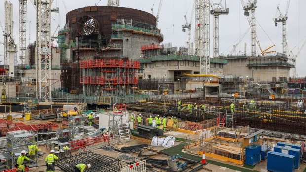 Contractors work near the Unit 1 nuclear reactor at Hinkley Point C nuclear power station construction site in Bridgwater, UK, on Wednesday, July 20, 2022.  Photographer: Hollie Adams/Bloomberg