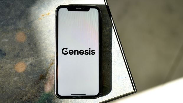 The Genesis logo on a smartphone arranged in the Brooklyn borough of New York, US, on Thursday, Nov. 17, 2022. Reverberations from the collapse of Sam Bankman-Fried’s empire continue to spread through financial markets, threatening the future of crypto lenders like BlockFi Inc. and Voyager Digital Ltd.